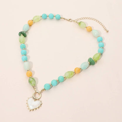 Heart Pendant Ring Accent Mixed Bead Necklace: Brown