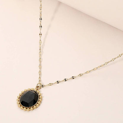 SECRET BOX_Stainless Steel Beaded Trim Oval Stone Pendant Necklace: Black